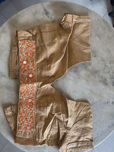 Elegant Orange Saree with Intricate Border