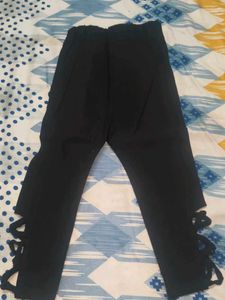 Stylish Black Pants with Decorative Buttons