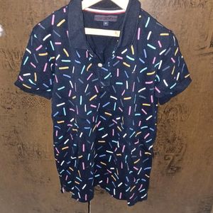 Tommy Hilfiger custom polo t-shirt for Boys, age 6 to 7yrs. black color with color full lines.