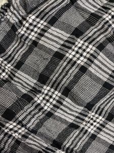 Chic Plaid Mini Dress with Black Trim