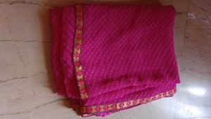 Vibrant Pink Saree with Floral Border