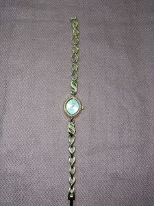 Elegant Gold Tone Watch with Rhinestones