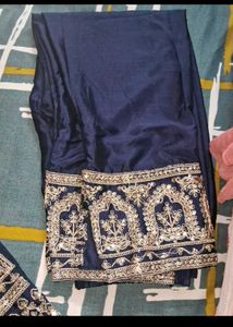 combo of suit and bag