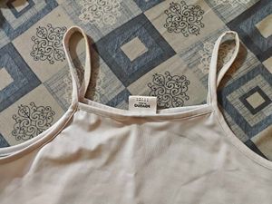 Sleek White Spaghetti Strap Crop Top