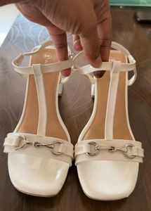 Elegant White heels with Detail