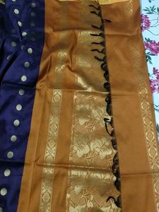 Designer Purple Saree with Orange Blouse