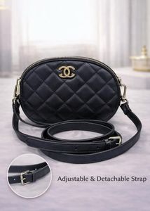 Black Quilted Oval Crossbody Bag