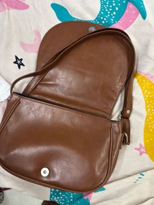 Brown sling bag