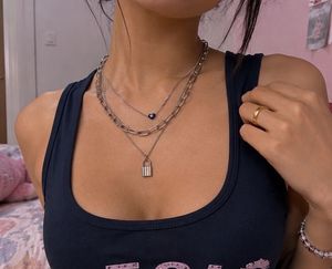 Layered Necklace with Lock & Evil Eye Charm