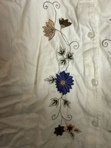 Embroidered Sleeveless Button-Up Top