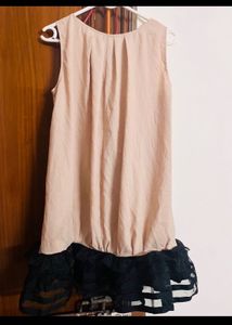 Frilled nude dress