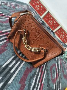 sale on Stylish Textured Brown sling Bag