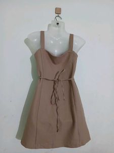 beige sleeveless A-line mini dress