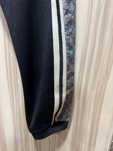 GUCCI GG Monogram Snake Print Black Jogger
