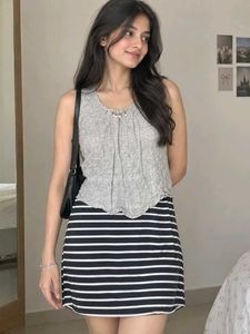 Chic Grey Sleeveless Top with Embellished Neckline