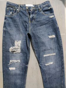 Distressed Blue Denim Jeans
