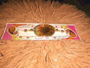Resin Rakhi with Pearl Beads
