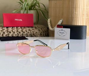 Prada Sunglasses - Gold Frame