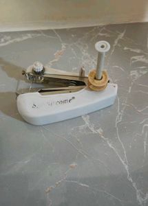 Vintage Handheld Sewing Machine