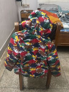 Dino Print Puffer Jacket by marks and spencer.
