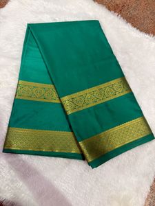 Elegant Emerald Green Saree with Gold Border