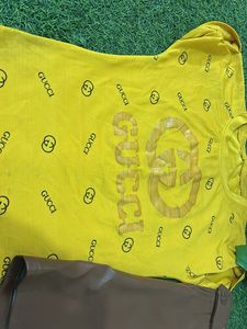 Cute Yellow Gucci Top and Brown leather skirt Set