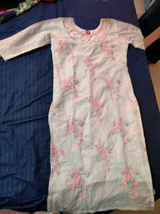 Embroidered organza kurti with net yoke.