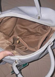 Caprese Peach satchel medium dull blue handbag