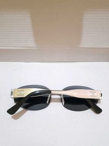 Celine Oval Rimless Sunglasses
