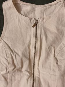 Sleeveless White Zip-Up Top