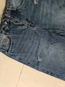 Distressed Blue Denim Jeans
