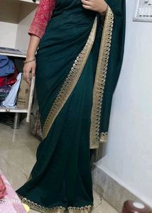 Elegant Green Saree with Gold Border