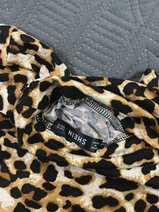 Leopard Print Turtleneck Top
