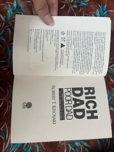 Rich Dad Poor Dadd by Robert T. Kiyos