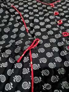 Black Printed Kurti with Red Polka-Dot Pants –