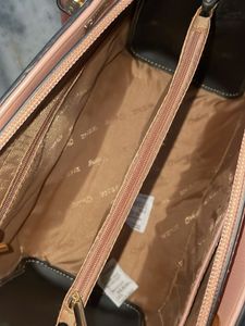 Chic Pink Embossed Handbag