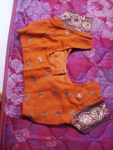 Elegant Orange Embroidered Saree