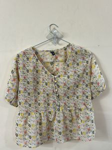 Floral Smocked Peplum Top