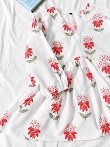 ( Anouk ) white short kurta with red floral print