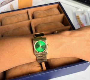 Gold Tone Watch with Green Dial