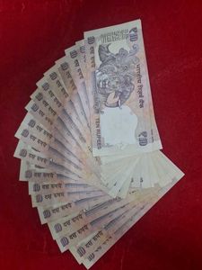 rare 10 rs 20 notes same number 457786