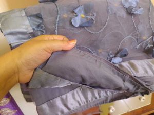 Gray net saree with butterfly patch work.