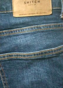 Distressed Blue Denim Jeans