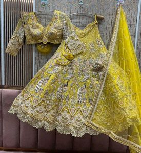 Stunning Yellow Peacock Embroidered Lehenga Choli