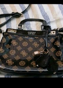 Guess Monogram Sling Bag