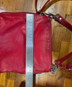 Red sling bag
