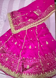 Stunning Magenta Bandhani Lehenga Choli