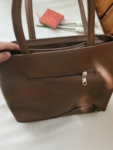 Chic Brown Handbag with V Accent