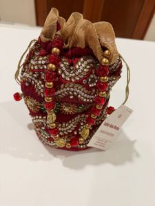 Brand new Maroon &amp; Embellished Potli Bag
