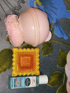 Pink Powder Puff For Babies And Decorated Diya